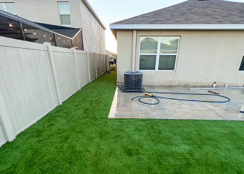 Additional concrete and artificial grass