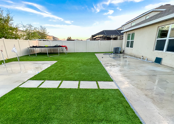 Additional concrete and artificial grass